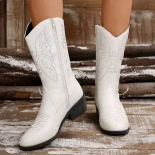 Women's black ankle boots with chunky heel, pointed toe, and hollow out detail on mid-calf winter boots