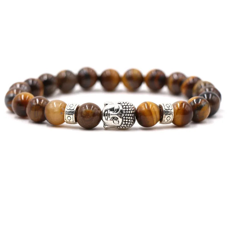 Natural stone stretch bracelet with round beads in various colours including Tigereye and turquoise.