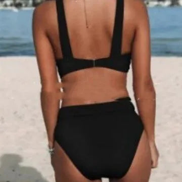 A woman's solid colour bikini set in a slim fit, shown in one of the available colours.