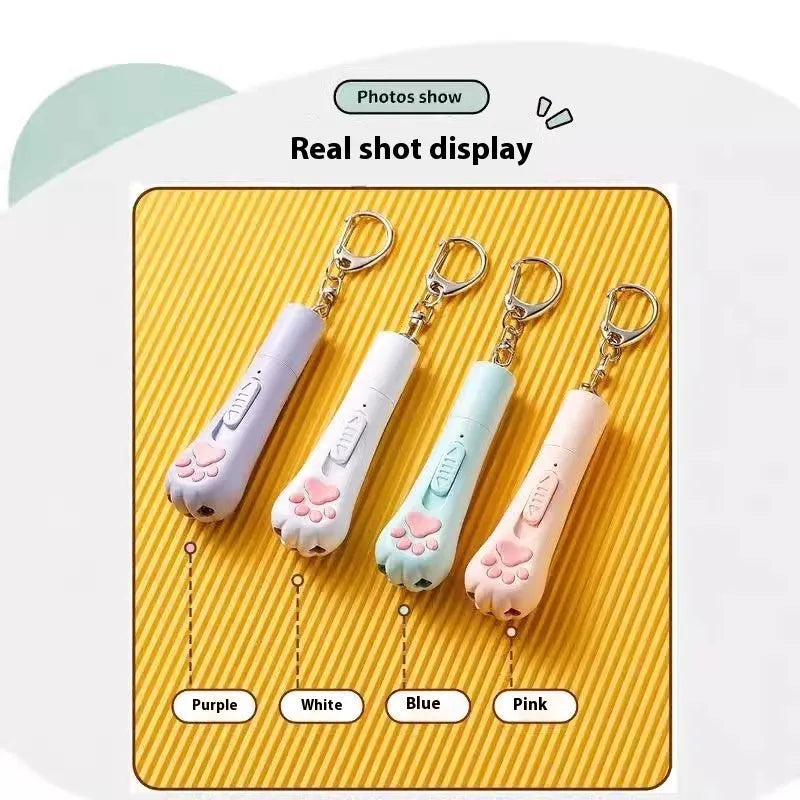 Cat teaser pen light toy with 15cm plastic wand and USB charging cable in cream white colour