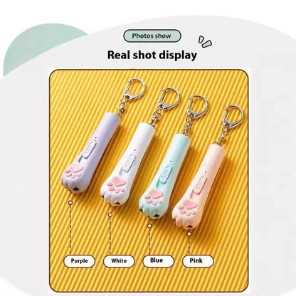 Cat teaser pen light toy with 15cm plastic wand and USB charging cable in cream white colour