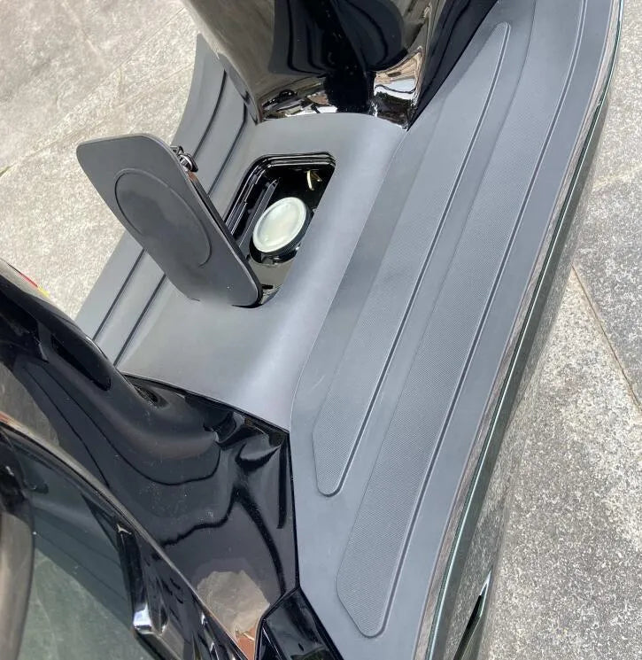 Motorcycle foot pad modification accessory made from rubber and plastic, designed for front foot positioning, with 3D textured patterns in black/grey or bronze/gold colour options and available in tank port open or closed styles.