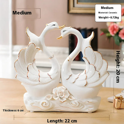 Handmade ceramic swan ornament with glazed surface in porcelain-like material