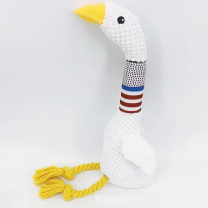 White plush dog toy with reinforced stitching, approximately 20cm long