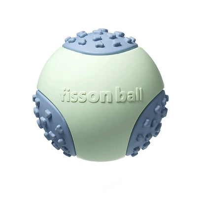 Green rolling ball dog toy with 64mm diameter for small to medium breeds on floor