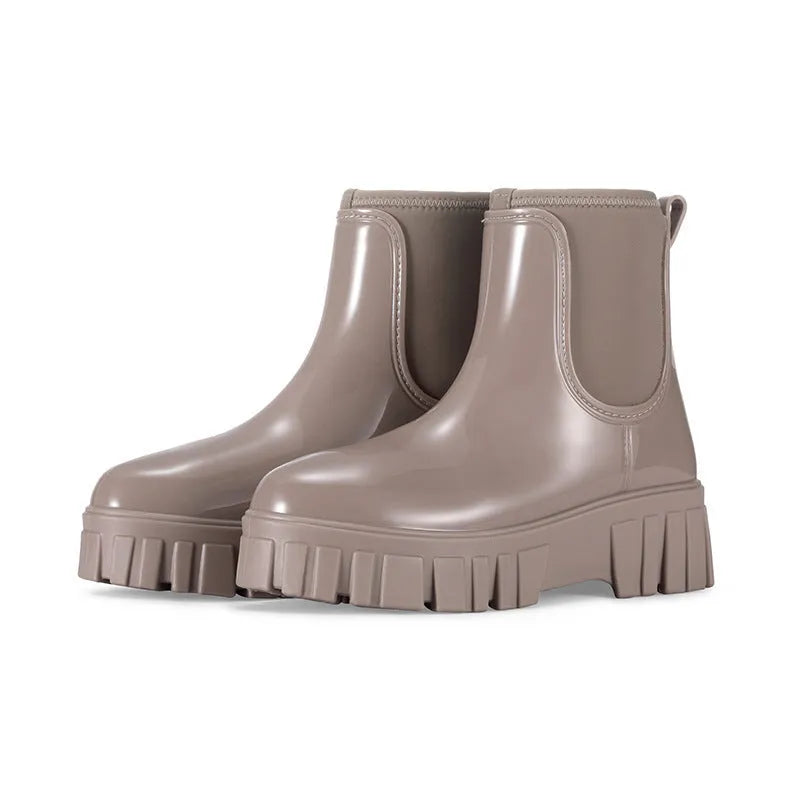 PVC low tube rain boots in apricot colour with non-slip sole and flat heel design