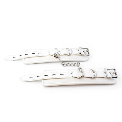White PU sponge bondage set showing handcuffs, footcuffs and neck cuff for comfortable restraint