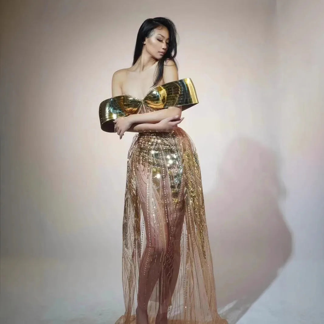 Gold strapless sequined tulle dress with thigh-high split and floor-length skirt