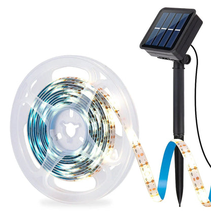 Compact 70x70mm solar LED strip with 90 lights in warm white, IP65 rated for garden paths