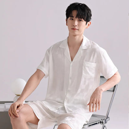 Men's artificial silk pyjama set with cardigan top and short trousers in a satin jacquard pattern.