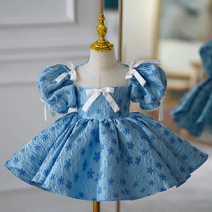 Blue polyester girls' princess dress with pettiskirt layering, shown in princess style for birthday occasions
