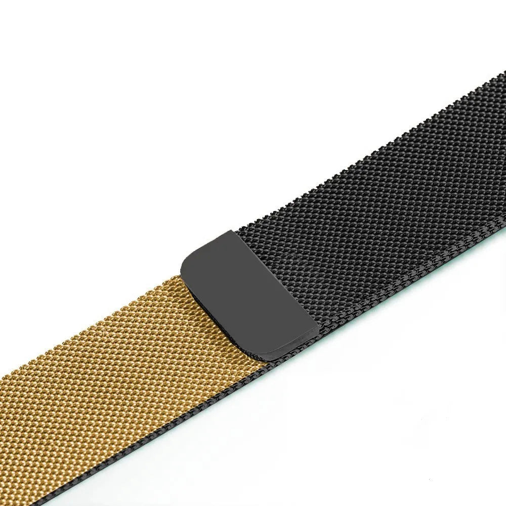 Stainless steel metal link strap for Apple Watch on a wrist, showing deployment clasp and polished finish