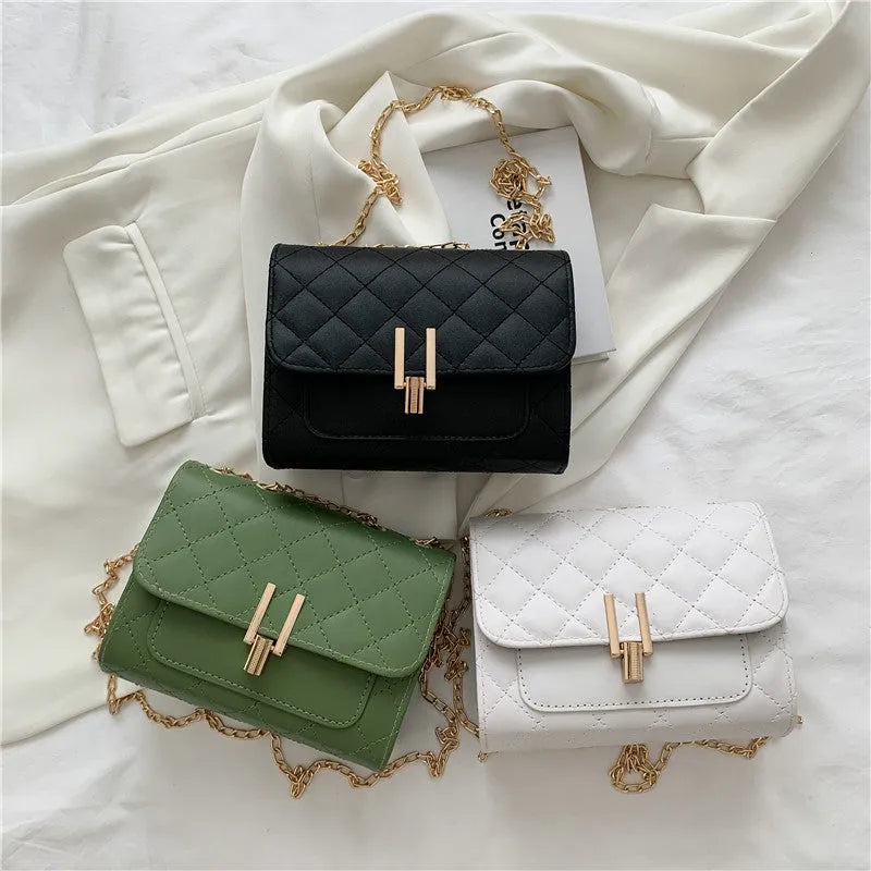 Women's solid colour PU leather crossbody bag with diamond lattice chain strap in black, green, or white.