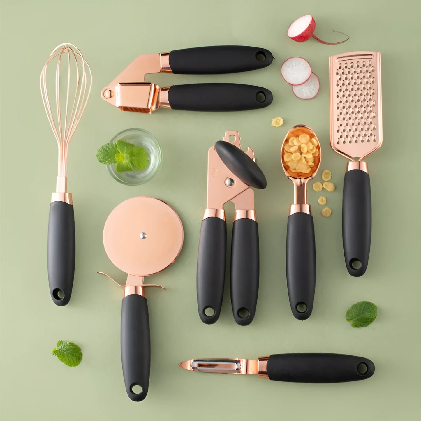Rose gold stainless steel kitchen tool set with copper accents including peeler and utensils in six colour options