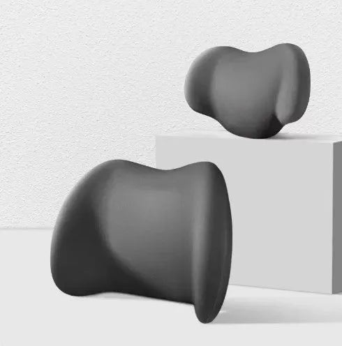 Black memory cotton car headrest cushion and matching lumbar support pillow on a car seat.