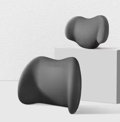 Black memory cotton car headrest cushion and matching lumbar support on a grey car seat.