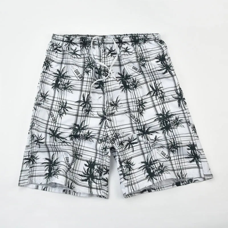 Men's floral printed swimming trunks in polyester fabric showing multiple pattern options for beach and pool use