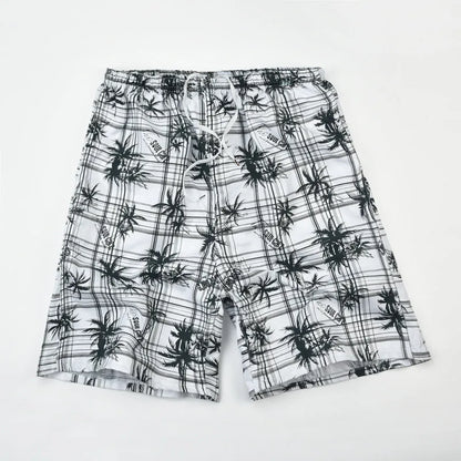 Men's floral printed swimming trunks in polyester fabric showing multiple pattern options for beach and pool use