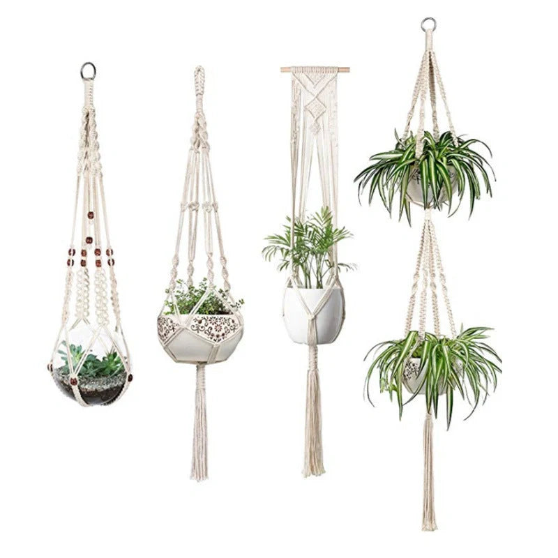 Set of four hand-made macrame hanging baskets for plants, made from 100% cotton rope.