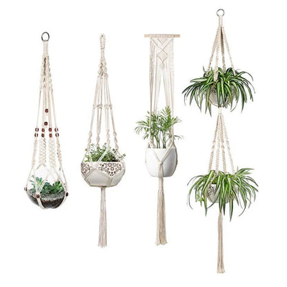 Set of four hand-made macrame hanging baskets for plants, made from 100% cotton rope.