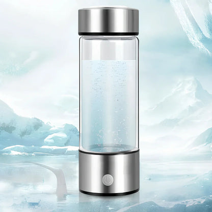 Portable hydrogen water cup in silver with borosilicate glass, showing electrolysis bubbles and romatic light, 3-minute generation