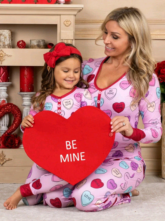 Cozy family matching Valentine's Day pajamas with heart-print design in cotton fabric