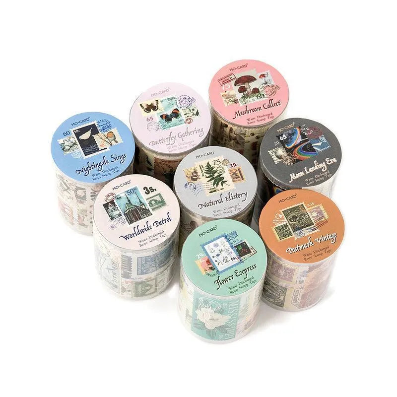 Roll of 55mm wide coated paper stamp decoration with repositionable adhesive backing for DIY journals and crafts