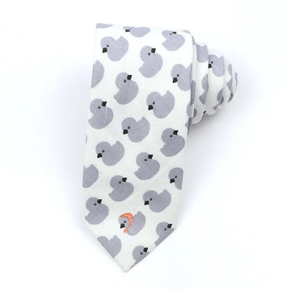 A narrow Korean-style cotton bow tie featuring a cartoon print, shown in a selection of colours.