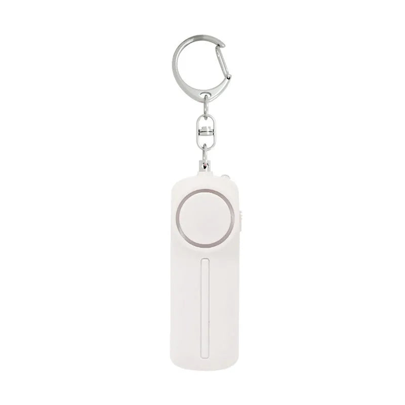 Compact pink self-defense alarm showing 86mm length with activation button and LED light
