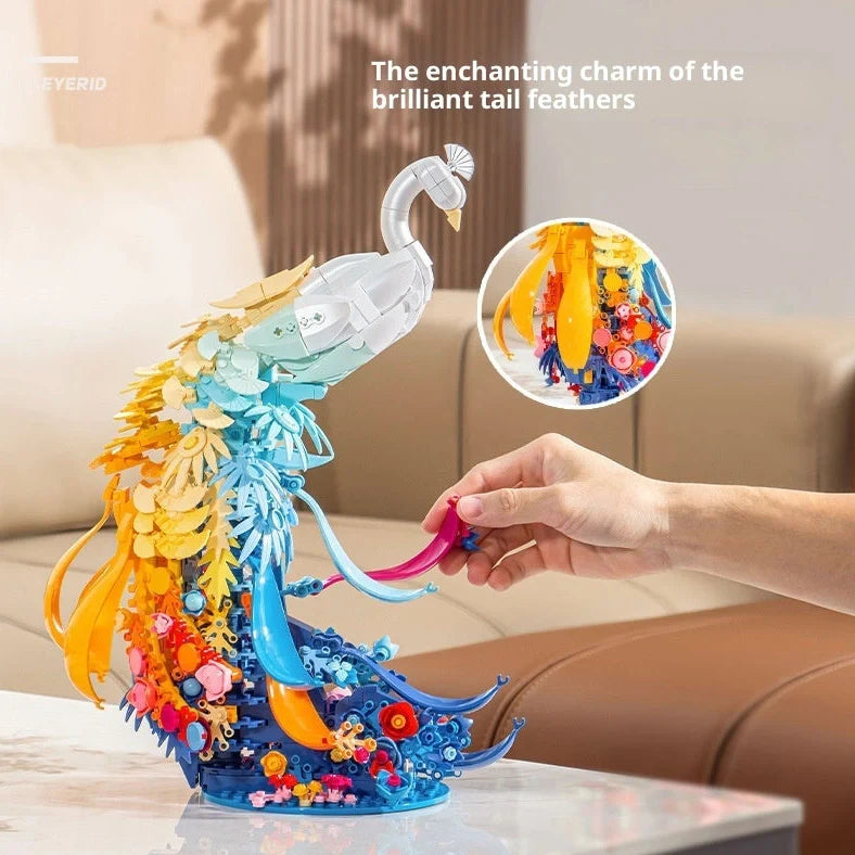 Colourful plastic building blocks assembled as peacock and swan designs with flower-like brocade patterns