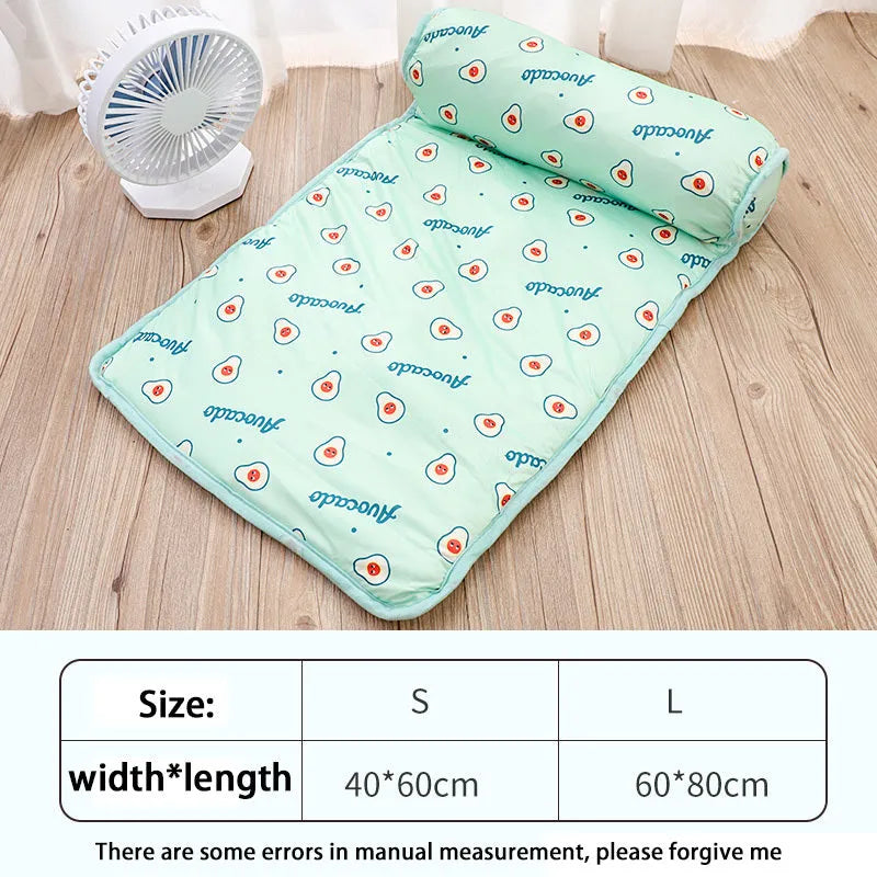 Pink blue green dog cooling mat on floor with pet, showing medium and large size options