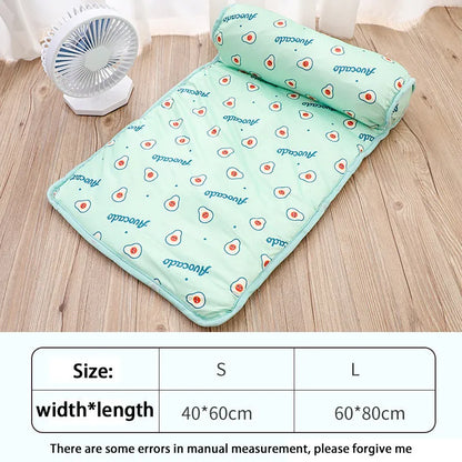 Pink blue green dog cooling mat on floor with pet, showing medium and large size options