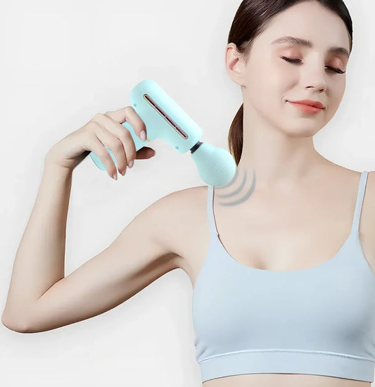 Green portable massage gun showing 20cm length with USB charging port and intensity controls