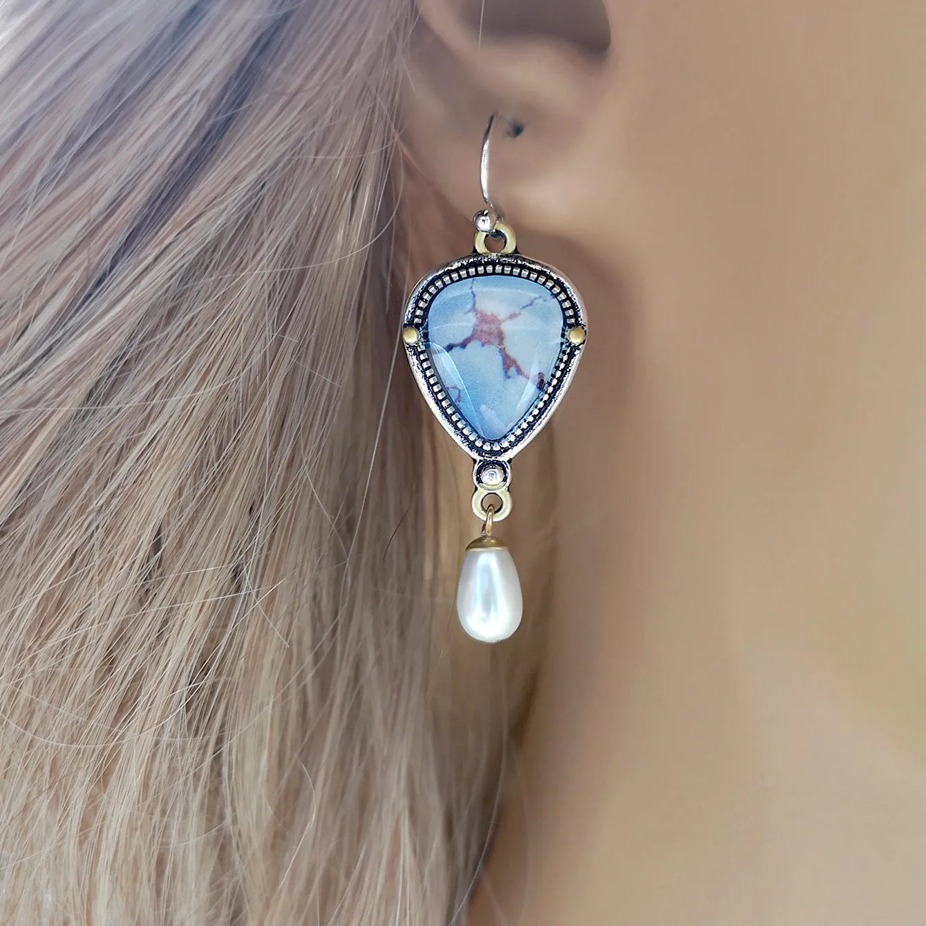 Retro blue geometric drop earrings with synthetic opal and pearl detail on a metal base.
