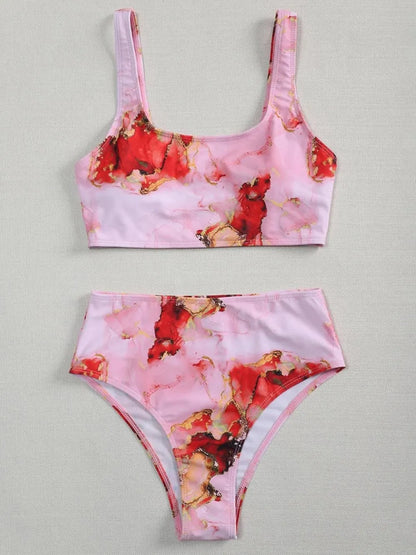 Women's high-waist bikini set with U-neck top in a blue marble tie-dye print.