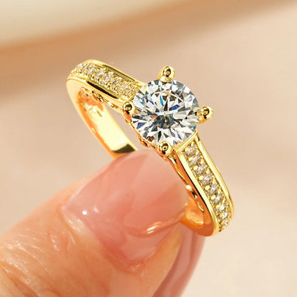 Women's geometric copper ring with electroplated finish and cubic zirconia stone in choice of six styles.