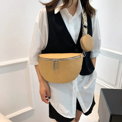 Women's solid colour PU crossbody bag with saddle lock zipper texture in clamshell design