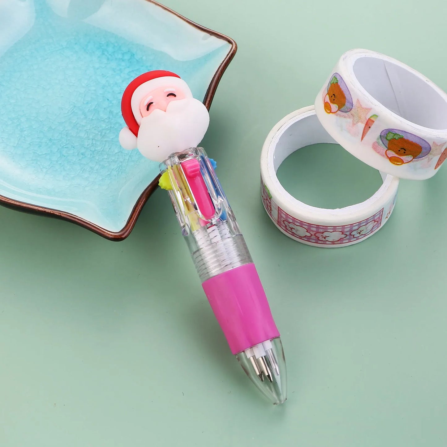 Christmas four-colour ballpoint pen with press mechanism showing festive designs