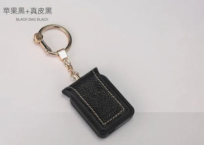 Bluetooth dual SIM adapter keychain in black leather with micro USB charging cable