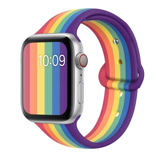 Silicone sports wristband with single buckle strap in black, rainbow, or white, sizes 38x40mm and 42x44mm