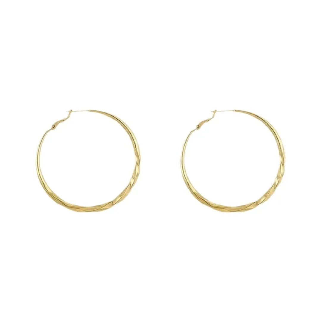 Twisted eyelet earrings in gold or silver electroplated metal, simple style, one pair
