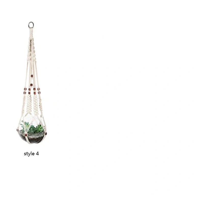 Set of four hand-made macrame hanging baskets for plants, made from 100% cotton rope.