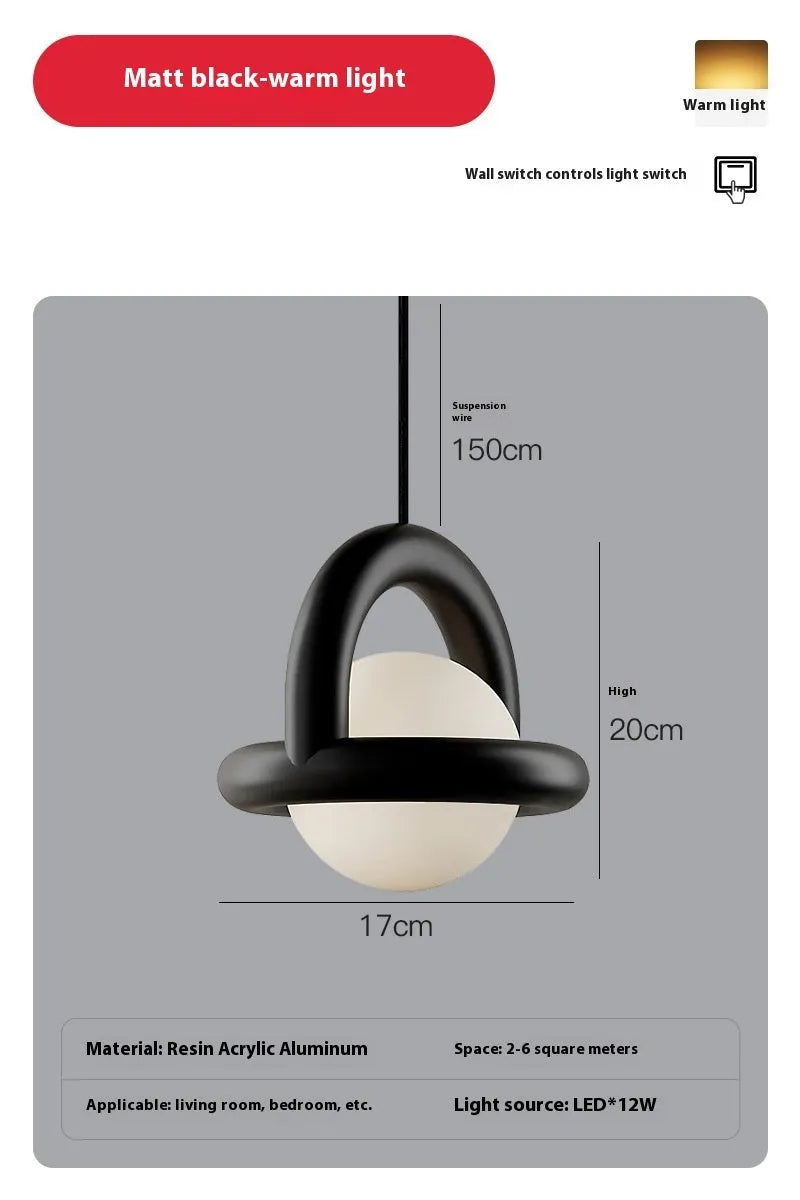 Danish designer hanging line lamp with adjustable cord and matte finish in bedside setting