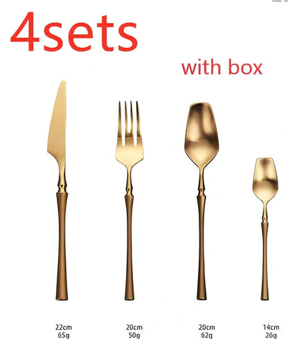 Four-piece stainless steel cutlery set showing main knife, fork, spoon, and teaspoon with mirror finish