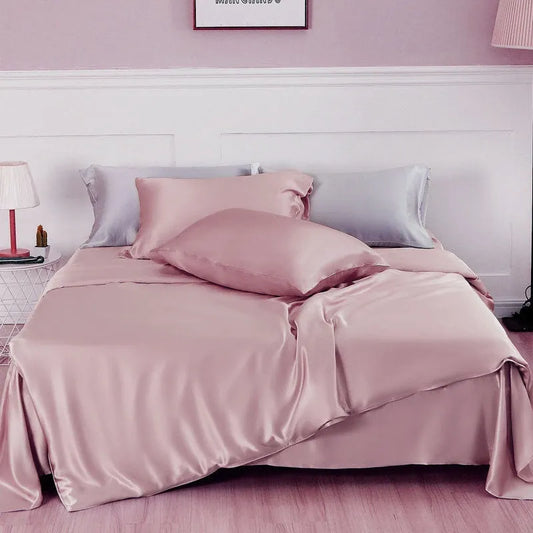 Double-sided silk duvet cover in solid colour showing plain weave texture and temperature-regulating mulberry silk fabric