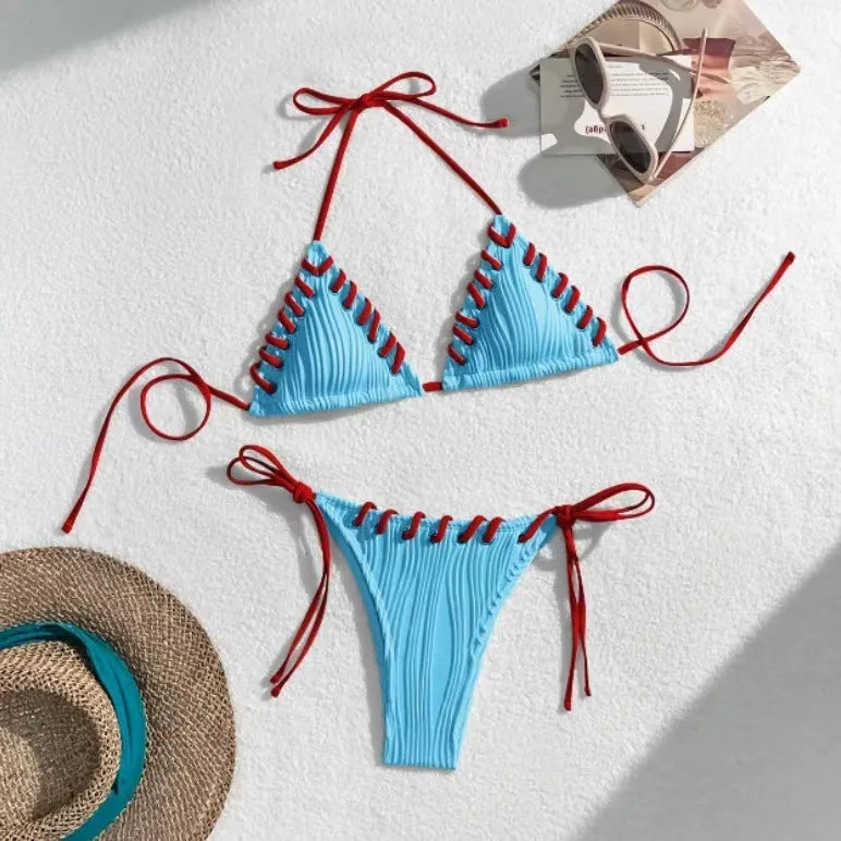 Women's solid colour polyester bikini with eye rope detail, briefs style, sizes S M L
