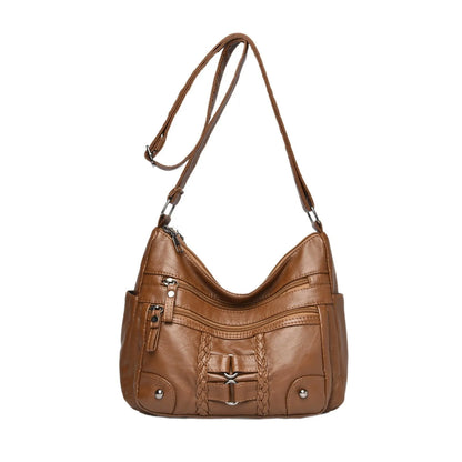 PU shoulder messenger bag with single strap, open outer pocket, and zip inner compartment in black, red, brown, or beige.