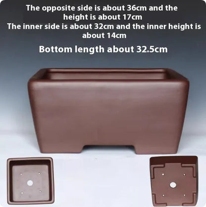Square purple clay succulent bonsai pot with classical design on wooden table