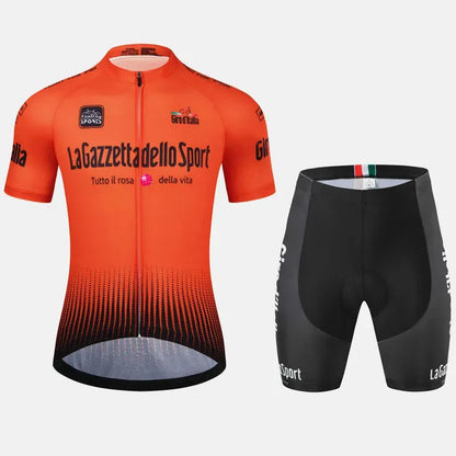 Loop short sleeve cycling suit in a patterned colour on a road bike, showing moisture-wicking fabric.