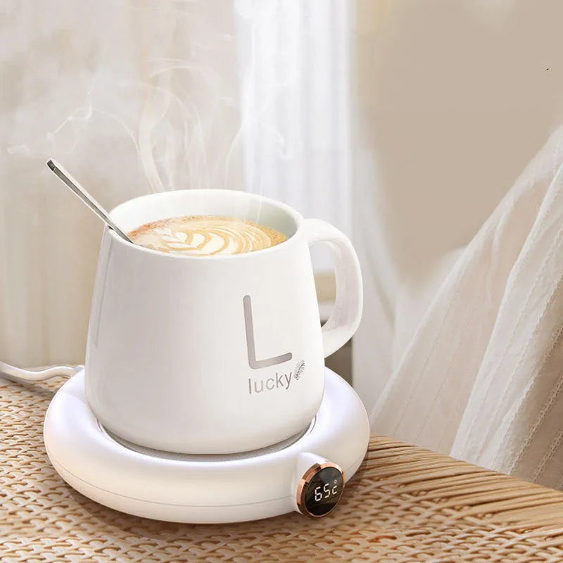 White USB coffee mug warmer heating pad on wooden desk